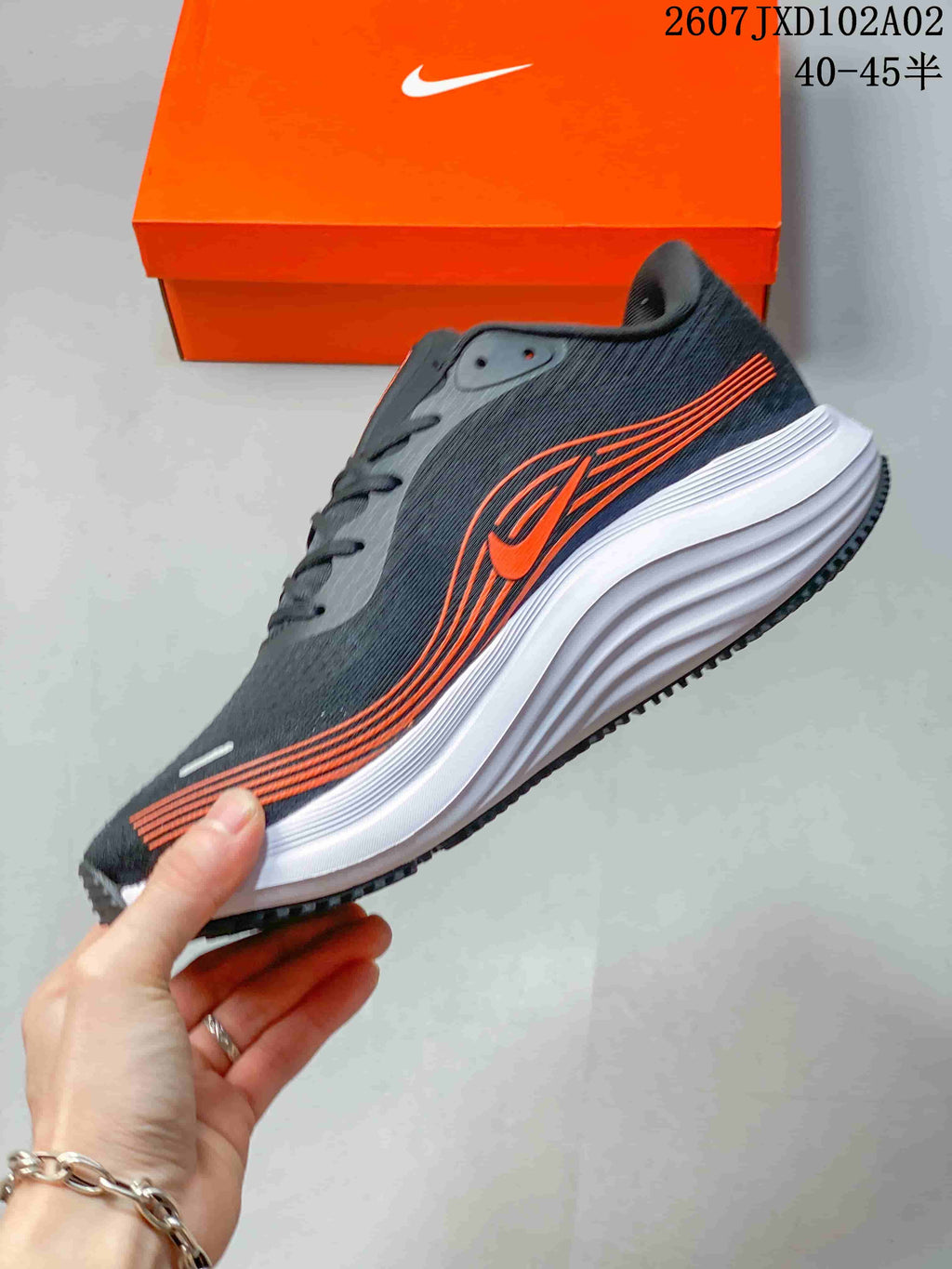 Nike Vomero Running Shoes in Charcoal and Orange