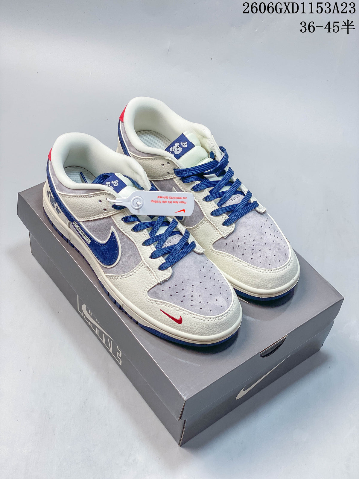 Nike SB Dunk Low Bearbrick-Inspired Cream and Blue Sneakers