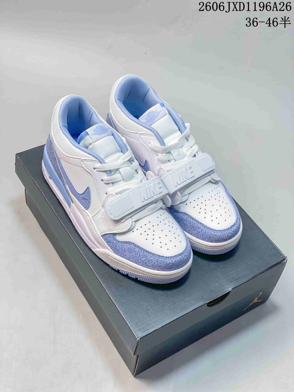 Air Jordan Legacy 312 Low Sneakers in White and Blue