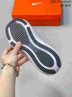 Nike Vomero Running Shoes in Charcoal and Orange