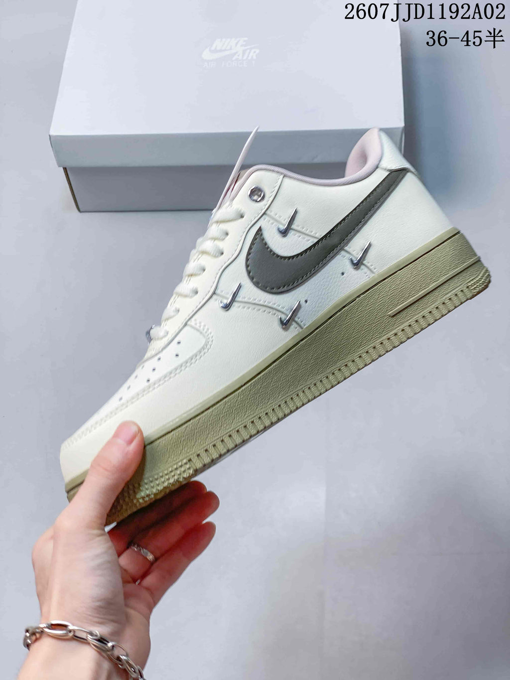 Nike Air Force 1 ’07 Low Sneakers in White and Olive
