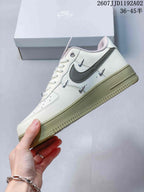 Nike Air Force 1 ’07 Low Sneakers in White and Olive