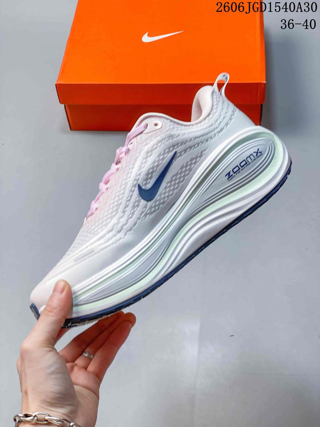 Nike Vomero Plus Running Shoes in White and Pink