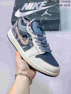 Jordan 1 Low Graffiti Sneakers in Gray and Cream
