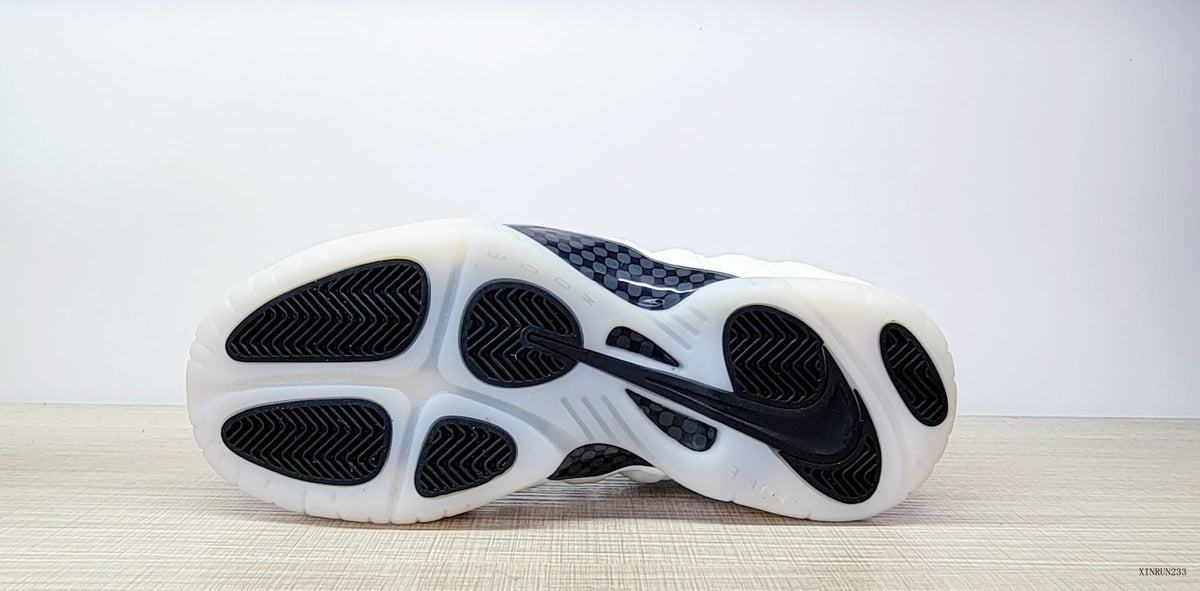 Nike Air Foamposite One High-Top Sneakers in Black, White and Blue