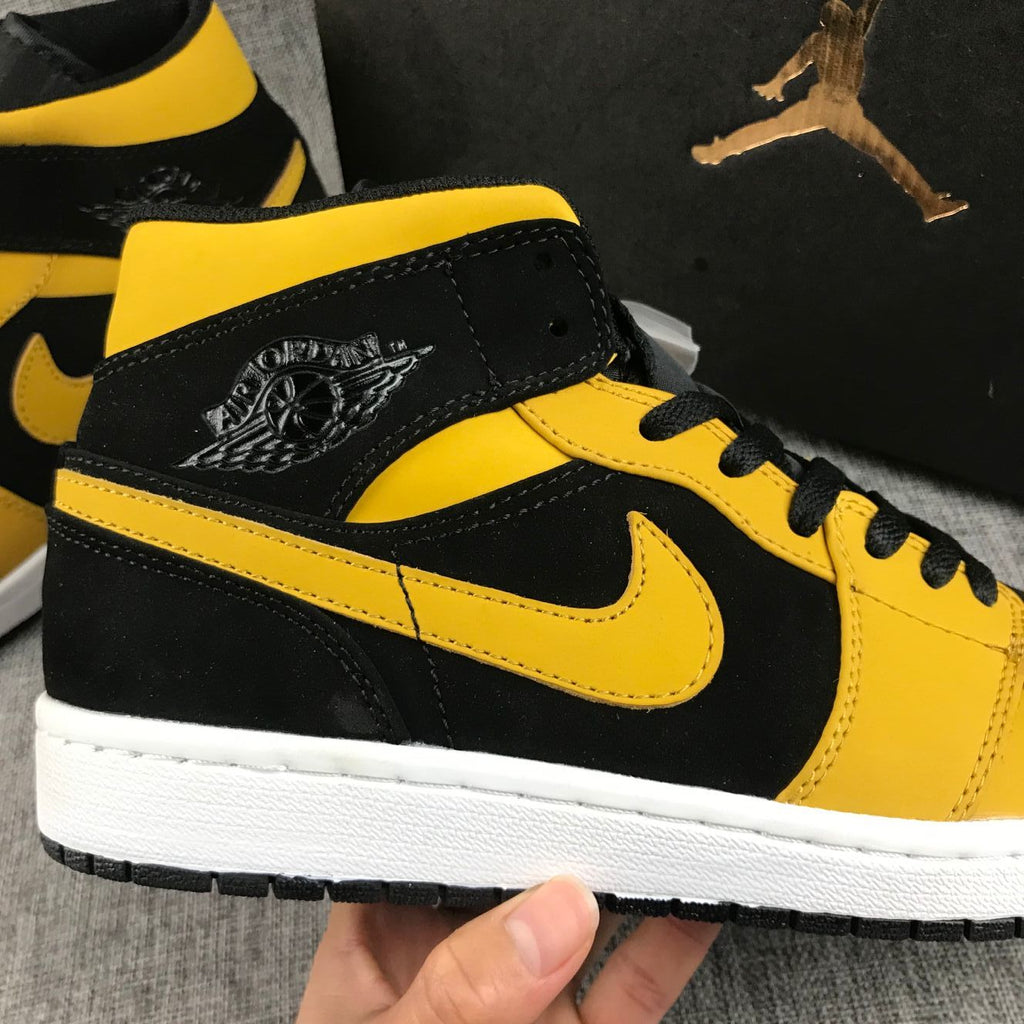 Air Jordan 1 Mid Black and Yellow Sneakers
