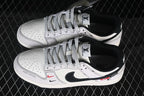 Nike SB Dunk Low White and Black Low-Top Sneakers