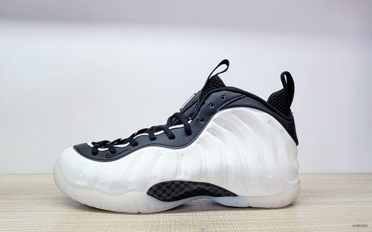 Nike Air Foamposite One High-Top Sneakers in Black, White and Blue
