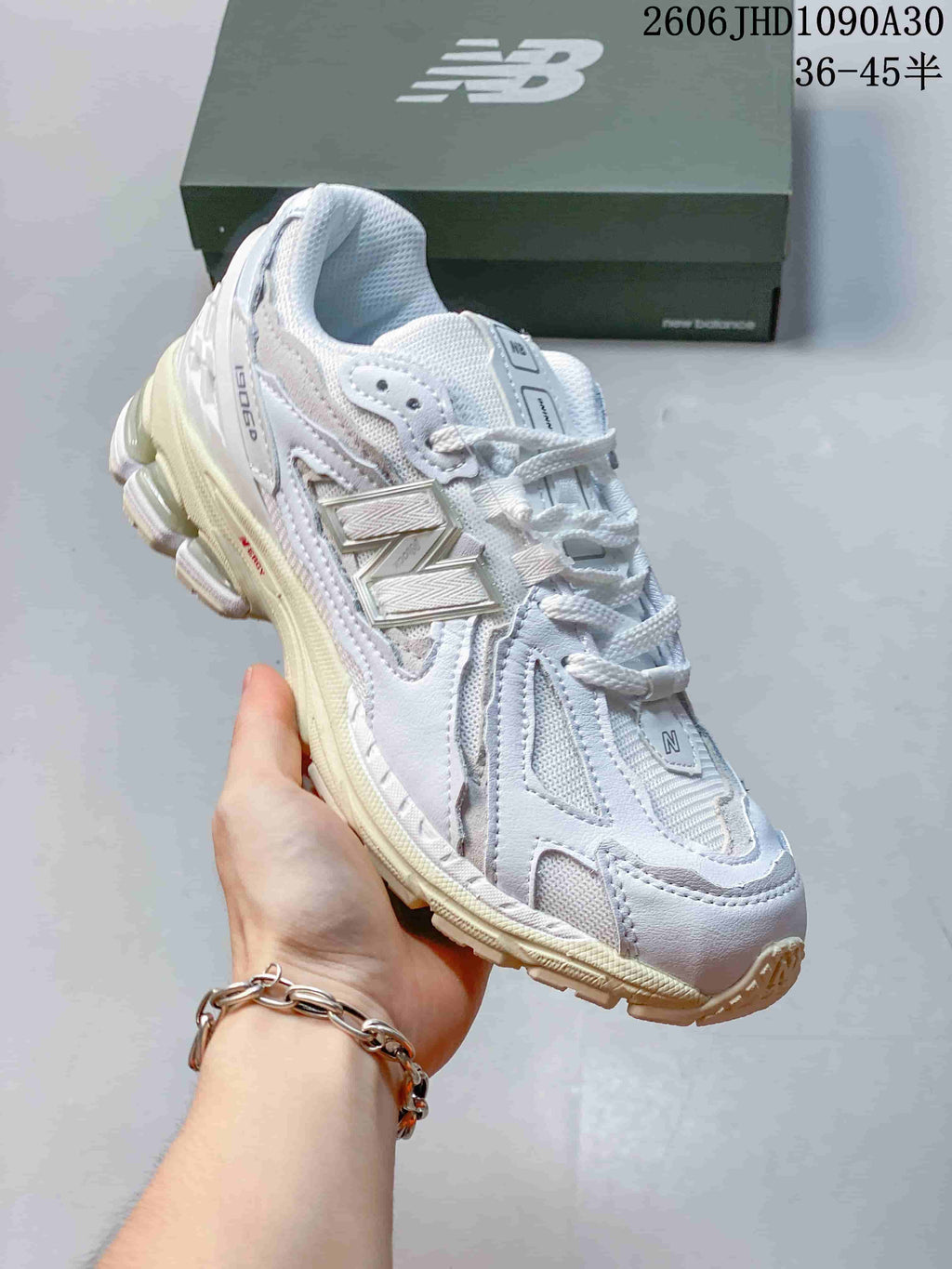 New Balance M1906R Sneakers in White and Silver