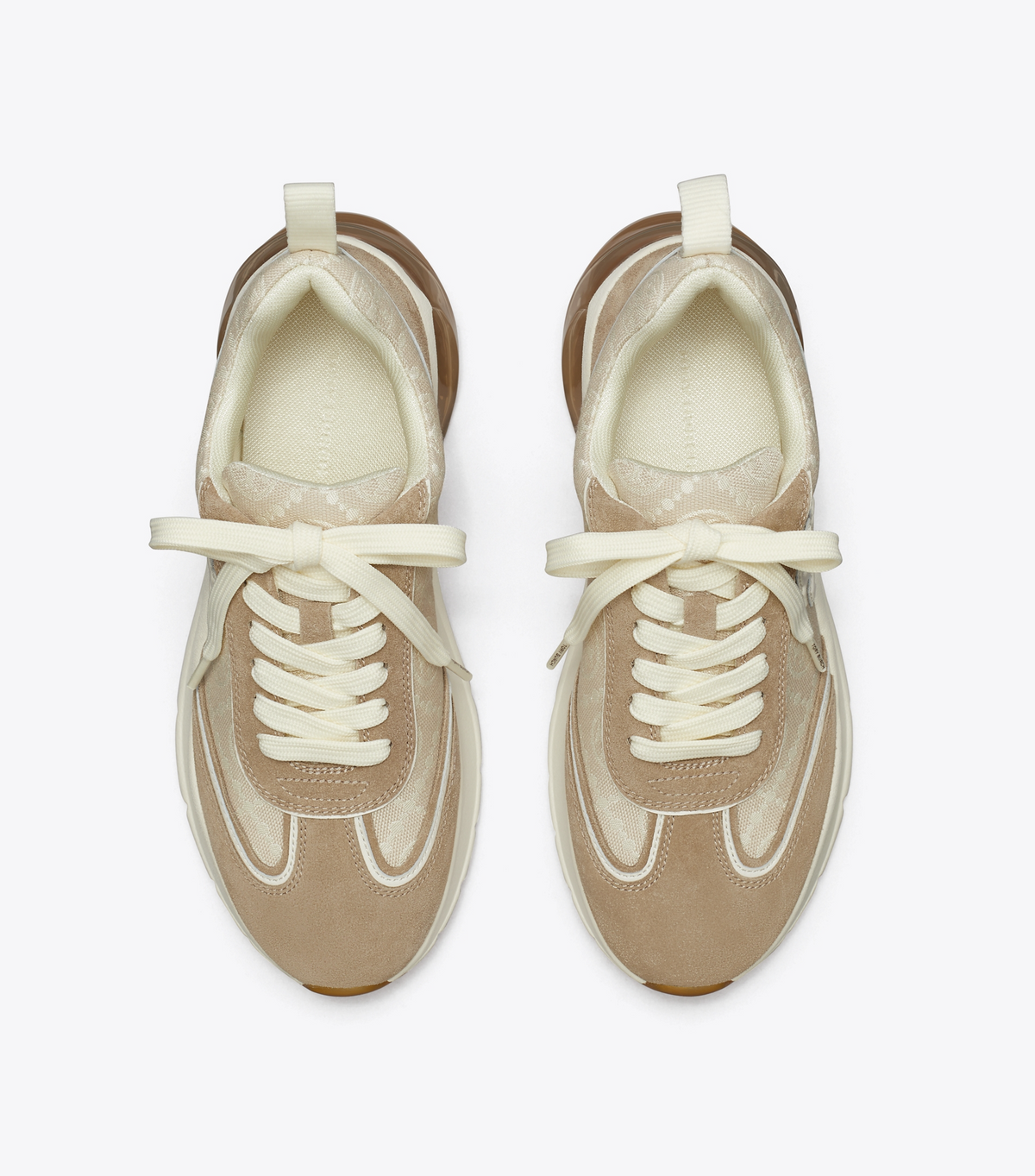 T MONOGRAM GOOD LUCK TRAINER